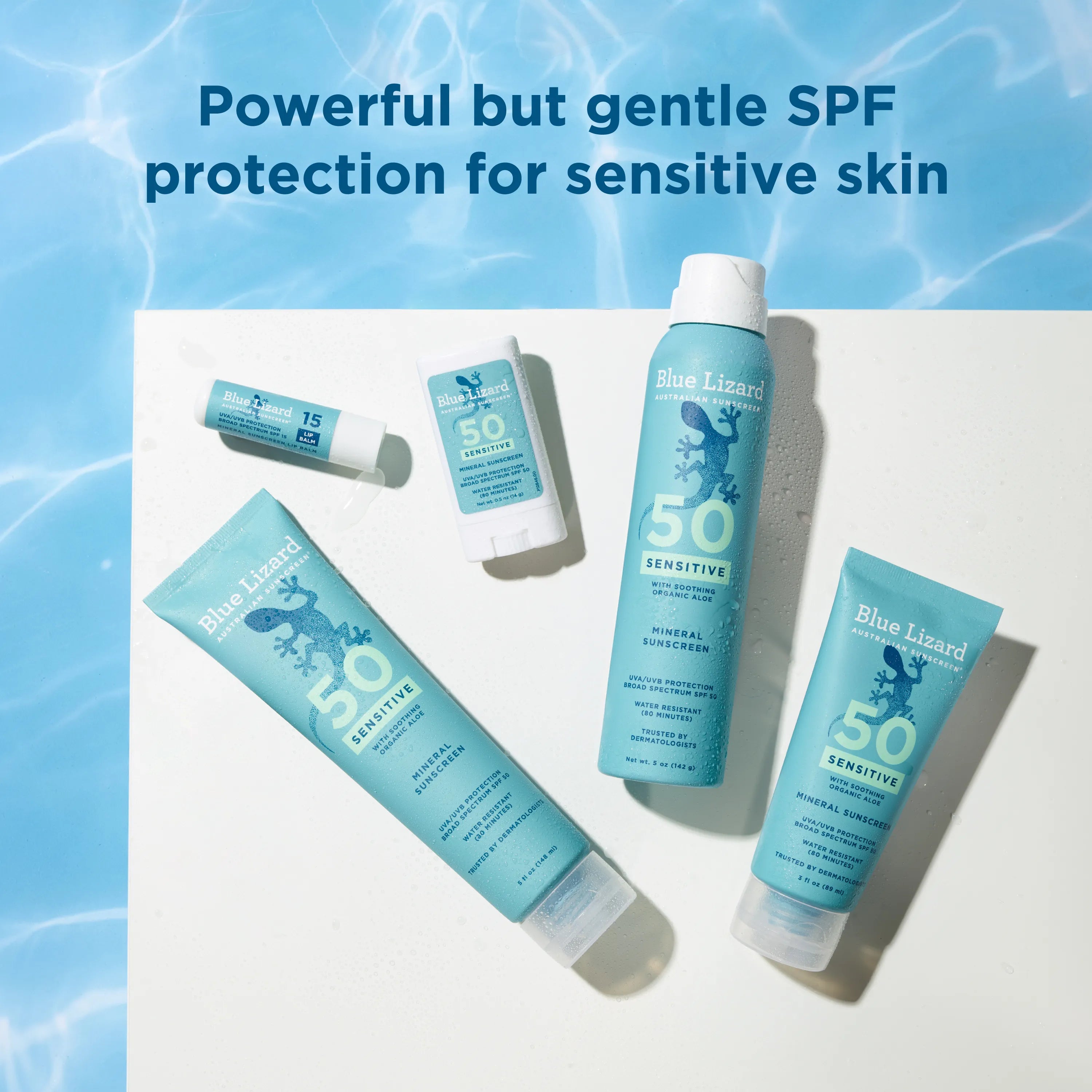Blue Lizard sensitive SPF 50 mineral sunscreen products on a white background with water around