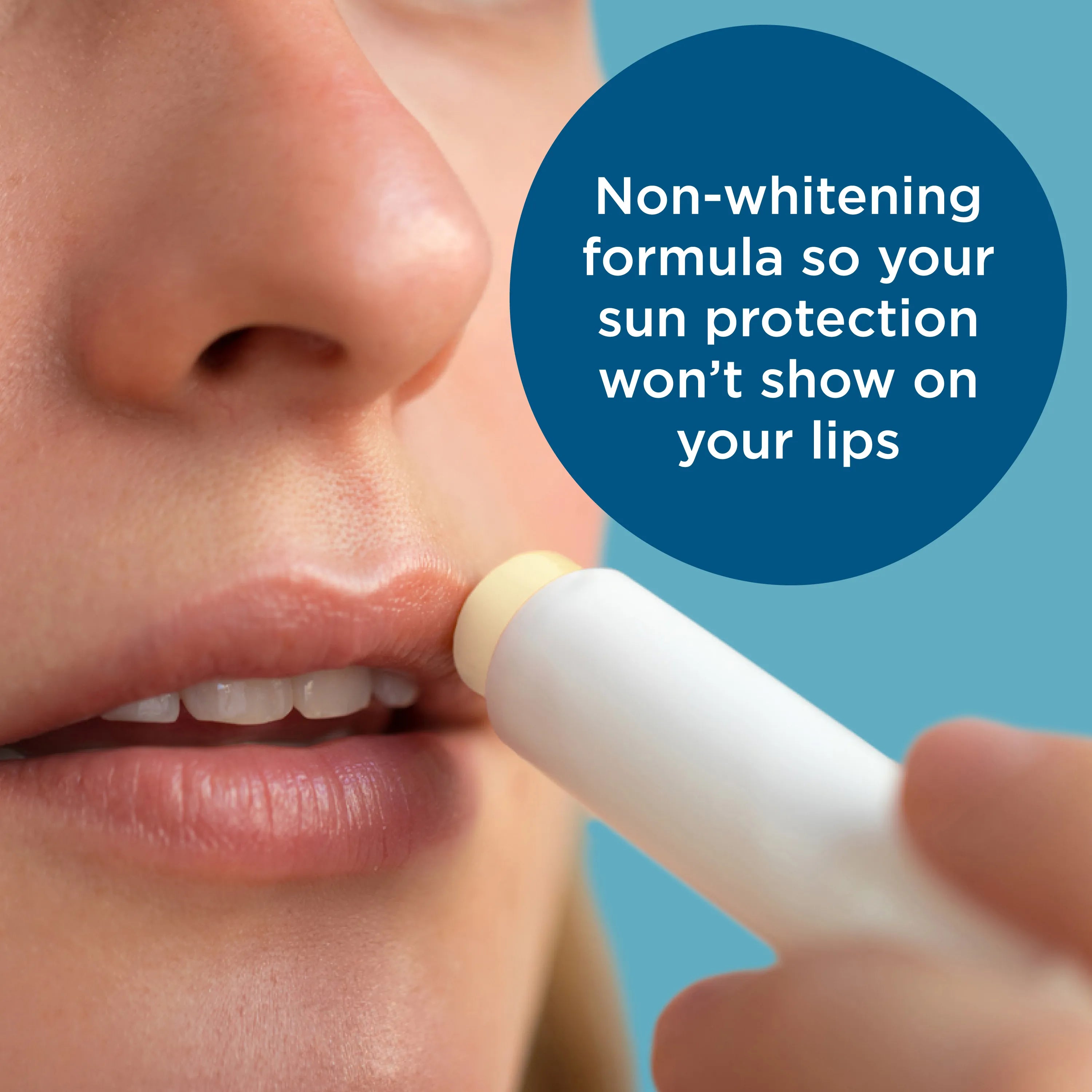 Person applying Blue Lizard SPF15 lip balm mineral sunscreen with text about non-whitening formula