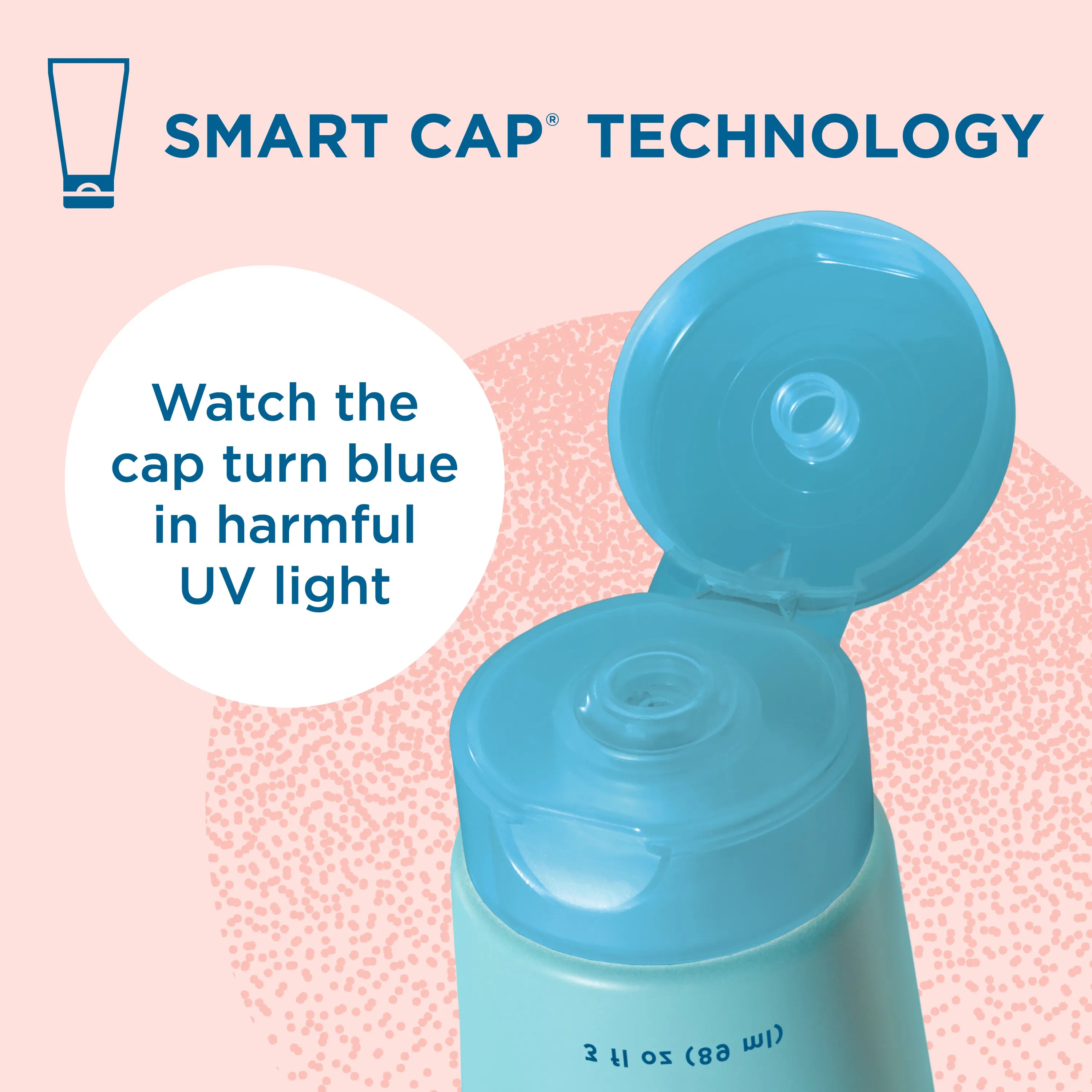 Baby mineral sunscreen bottle with open cap on a pink background, featuring Smart Cap Technology text.